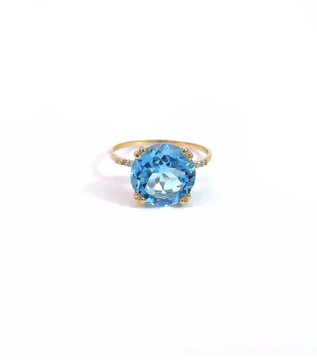 Anello con sales diamante azzurro